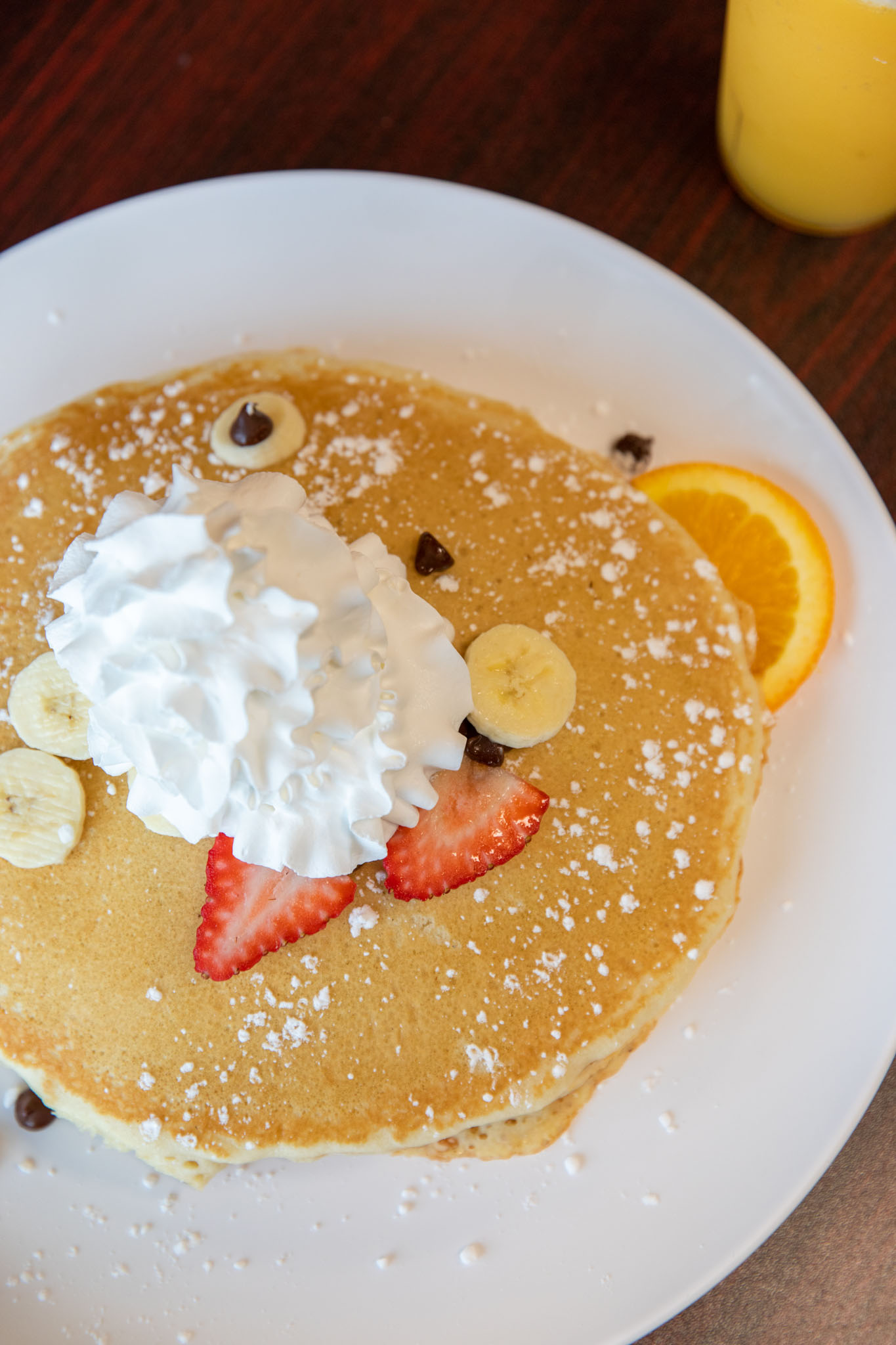 Pancake topped with whipped cream