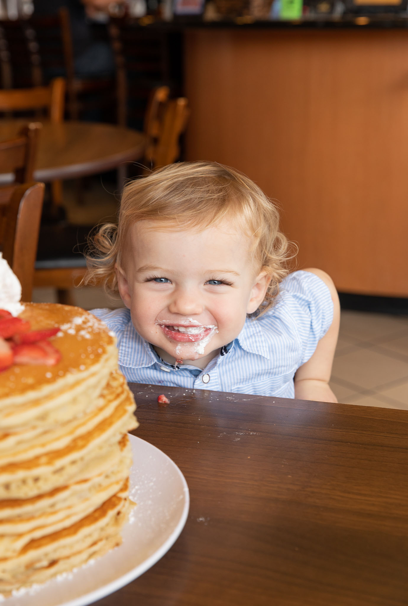 Baby eating a Stack of Pancakes at The Pancakery